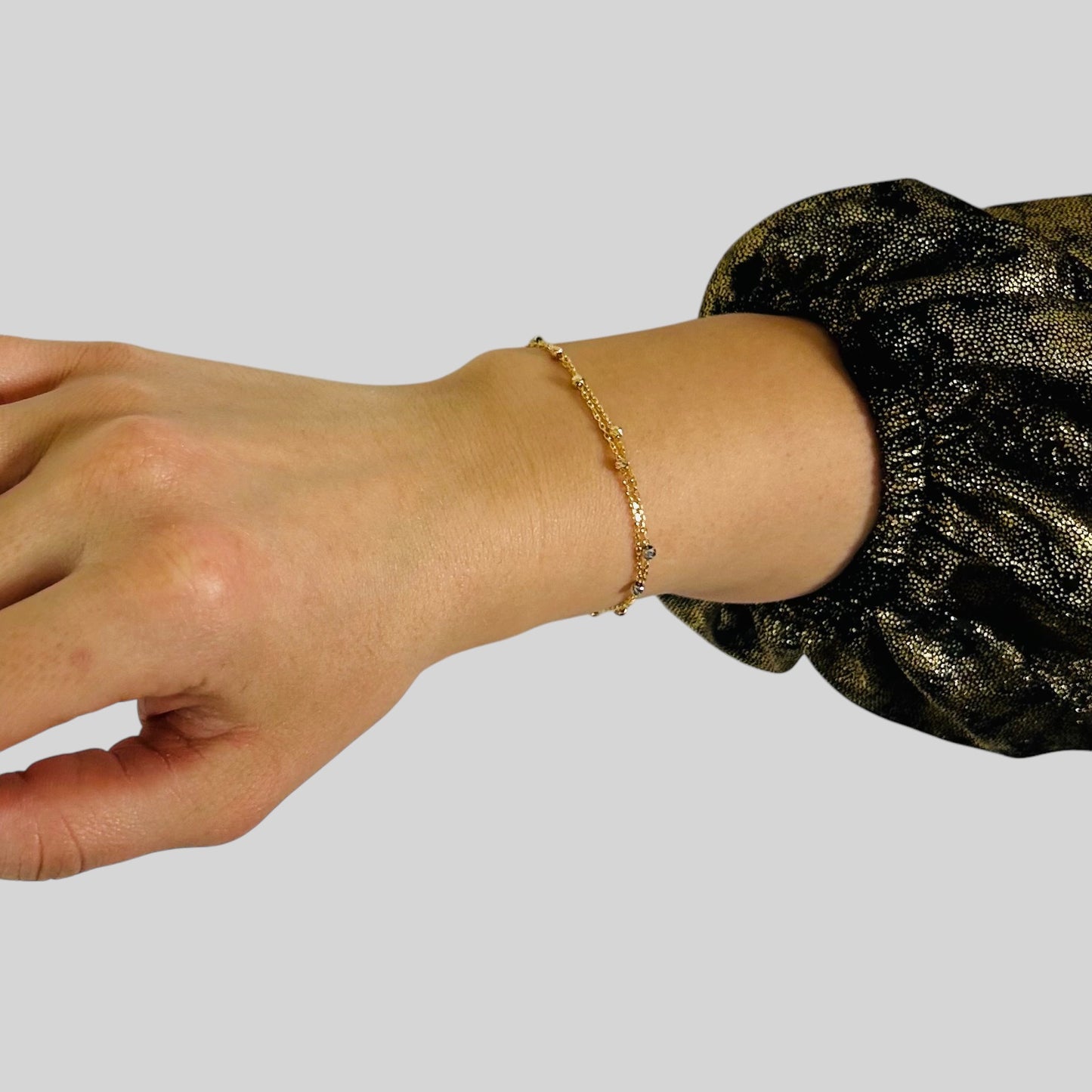Bracciale Intrecciato in Oro 18 Carati con Sfere Eleganti