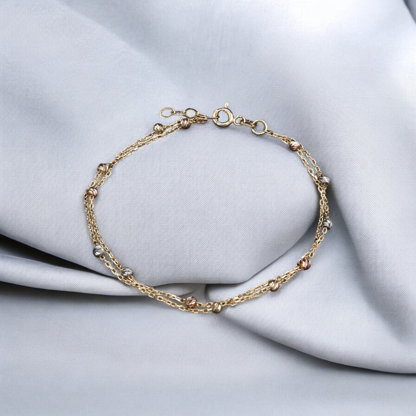 18K Gold Braided Bracelet with Sphere Details